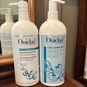 New unopened Ouidad Curl Quencher shampoo/conditioner liters.
